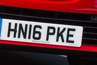 Identify the letters and numbers in this image
