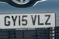 Identify the letters and numbers in this image