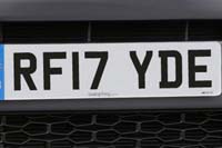 Identify the letters and numbers in this image