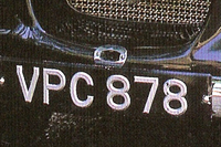 Identify the letters and numbers in this image