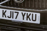 Identify the letters and numbers in this image