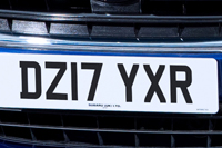 Identify the letters and numbers in this image