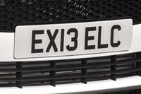 Identify the letters and numbers in this image