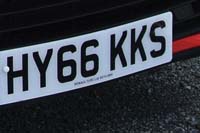 Identify the letters and numbers in this image