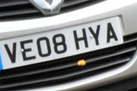 Identify the letters and numbers in this image