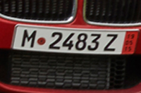 Identify the letters and numbers in this image