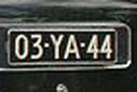 Identify the letters and numbers in this image