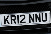 Identify the letters and numbers in this image