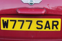 Identify the letters and numbers in this image