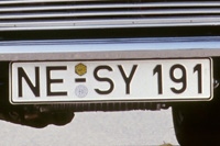 Identify the letters and numbers in this image