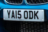 Identify the letters and numbers in this image