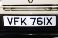 Identify the letters and numbers in this image