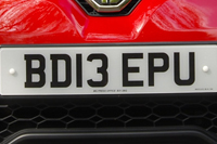 Identify the letters and numbers in this image