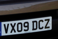 Identify the letters and numbers in this image