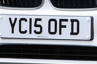 Identify the letters and numbers in this image