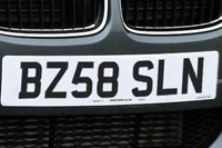 Identify the letters and numbers in this image