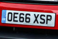 Identify the letters and numbers in this image