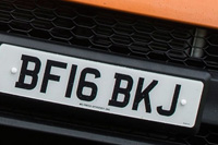 Identify the letters and numbers in this image