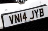 Identify the letters and numbers in this image