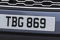 Identify the letters and numbers in this image