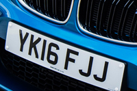 Identify the letters and numbers in this image