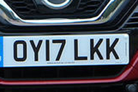 Identify the letters and numbers in this image