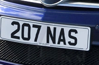 Identify the letters and numbers in this image