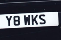 Identify the letters and numbers in this image