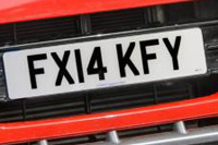 Identify the letters and numbers in this image