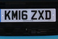 Identify the letters and numbers in this image