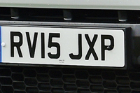 Identify the letters and numbers in this image