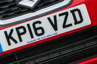 Identify the letters and numbers in this image