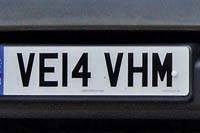 Identify the letters and numbers in this image