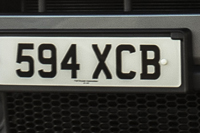 Identify the letters and numbers in this image