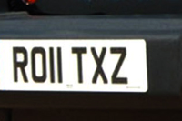 Identify the letters and numbers in this image