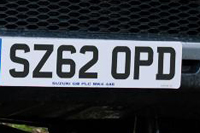 Identify the letters and numbers in this image