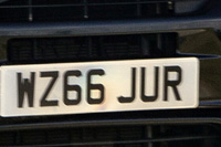Identify the letters and numbers in this image