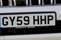 Identify the letters and numbers in this image