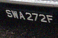 Identify the letters and numbers in this image