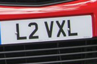 Identify the letters and numbers in this image