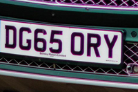 Identify the letters and numbers in this image