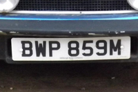 Identify the letters and numbers in this image