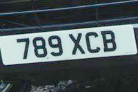 Identify the letters and numbers in this image