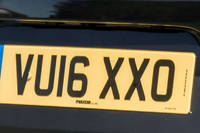 Identify the letters and numbers in this image