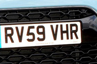 Identify the letters and numbers in this image