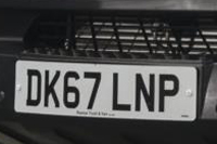 Identify the letters and numbers in this image