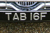 Identify the letters and numbers in this image