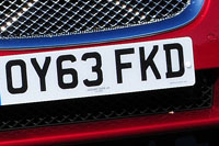 Identify the letters and numbers in this image