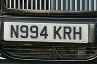 Identify the letters and numbers in this image