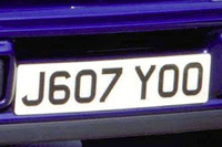 Identify the letters and numbers in this image